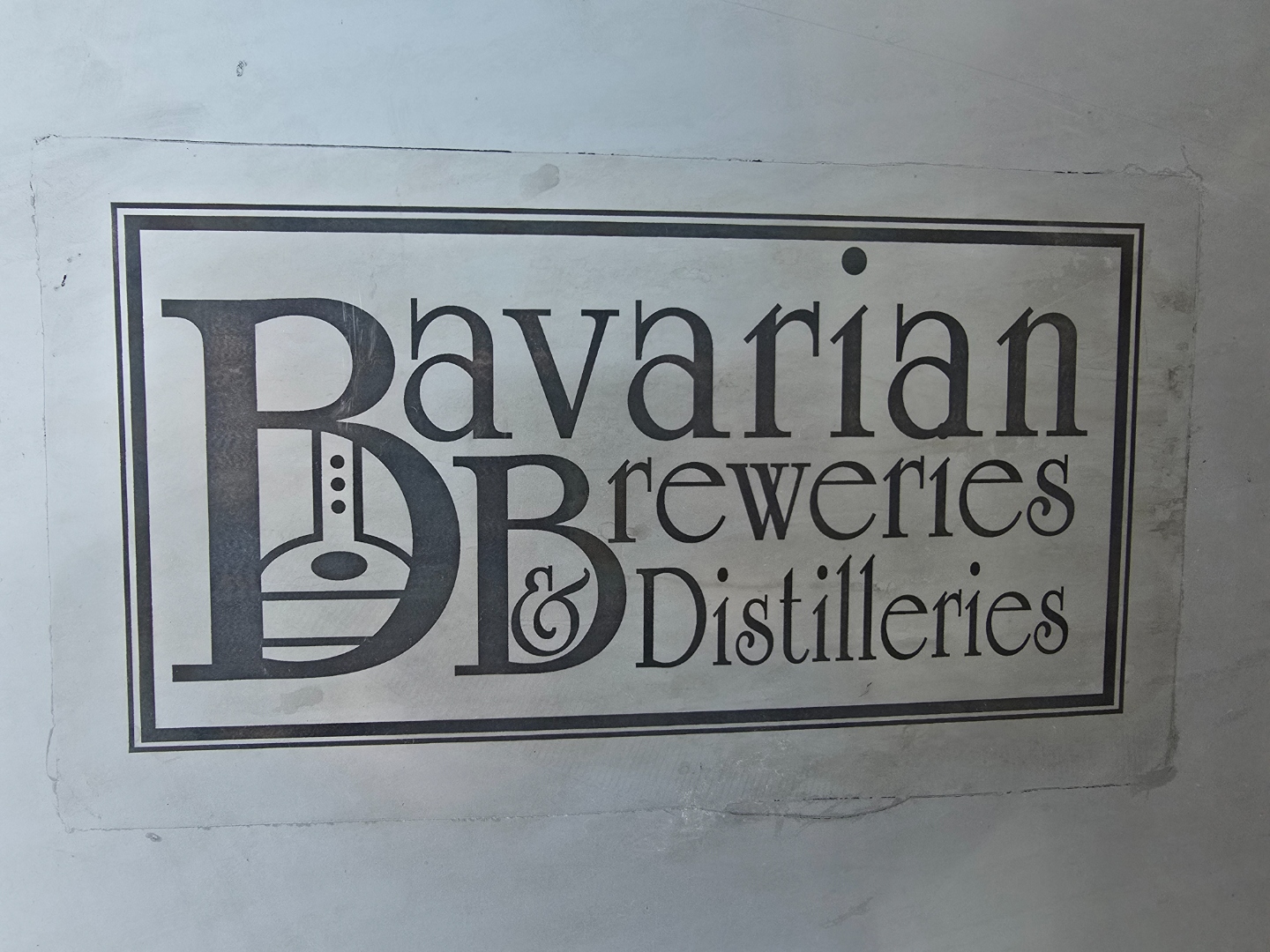 Bavarian Breweries & Distilleries logo close-up on tank