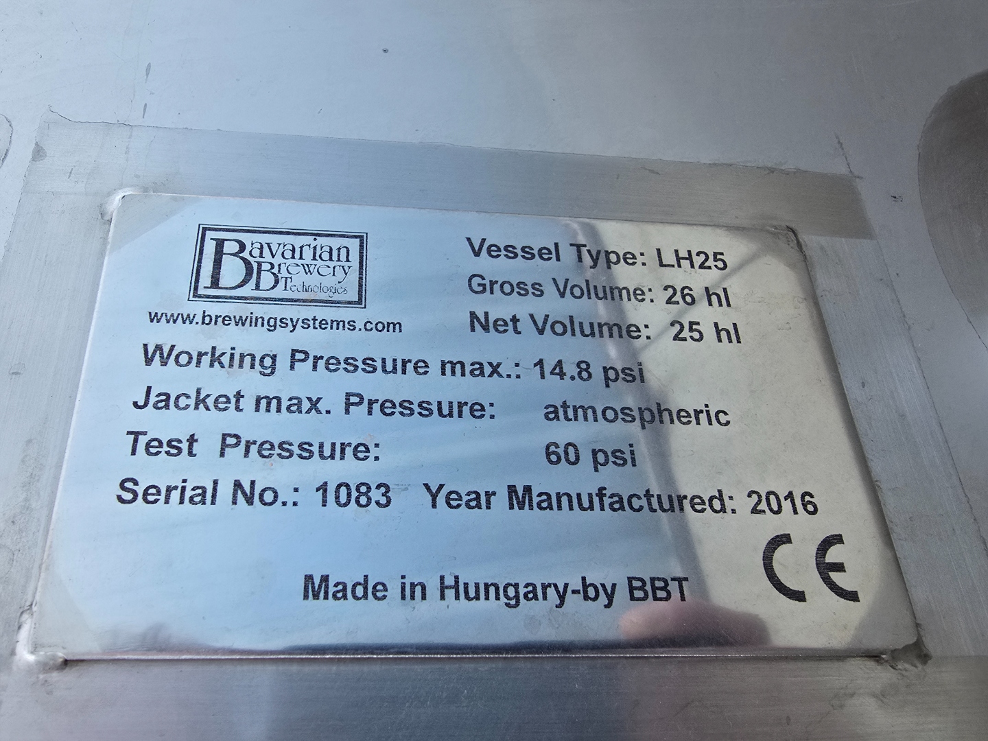 Clear nameplate photo showing LH25 specs, Serial 1083