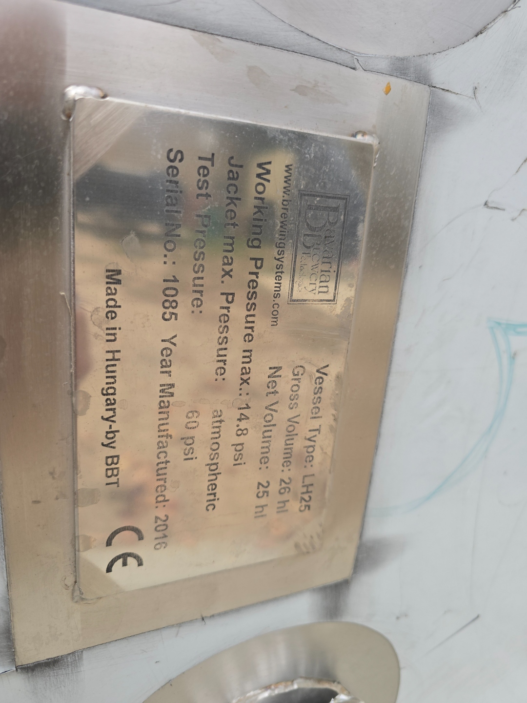 Tank side view showing jacket seam and fittings